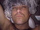 Robbie Williams grau und lockig