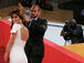 Cheryl Cole k&auml;mpft sich in Cannes durch den Regen
